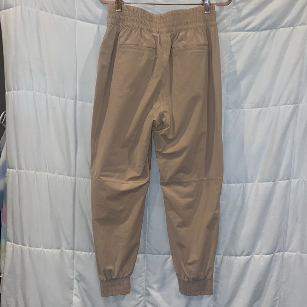 Calia by Carrie Underwood Nyluxe Joggers Pale Pink Size Small Zip Ankle - Picture 8 of 15